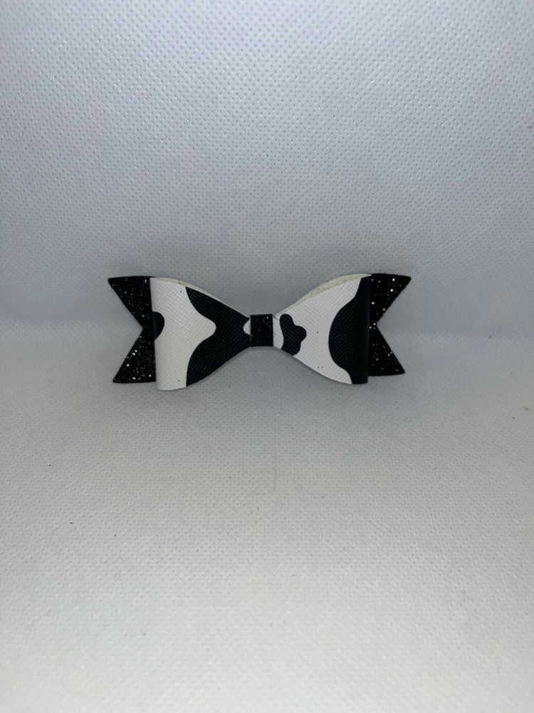 Cow print faux leather bow